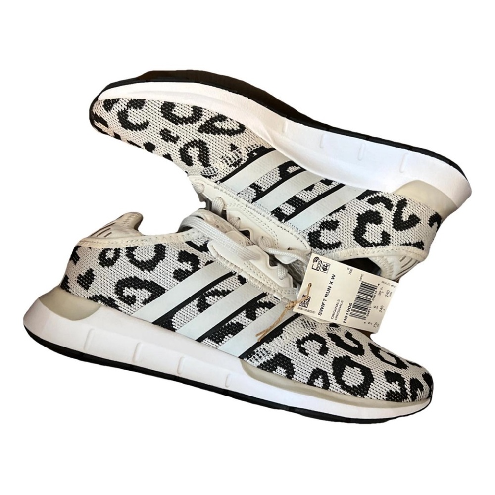 Brand new white and black cheetah adidas! With box.